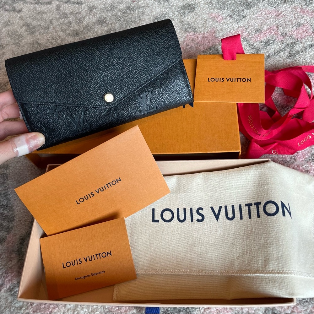 Authentic Louis Vuitton black monogram empriente leather Sarah wallet